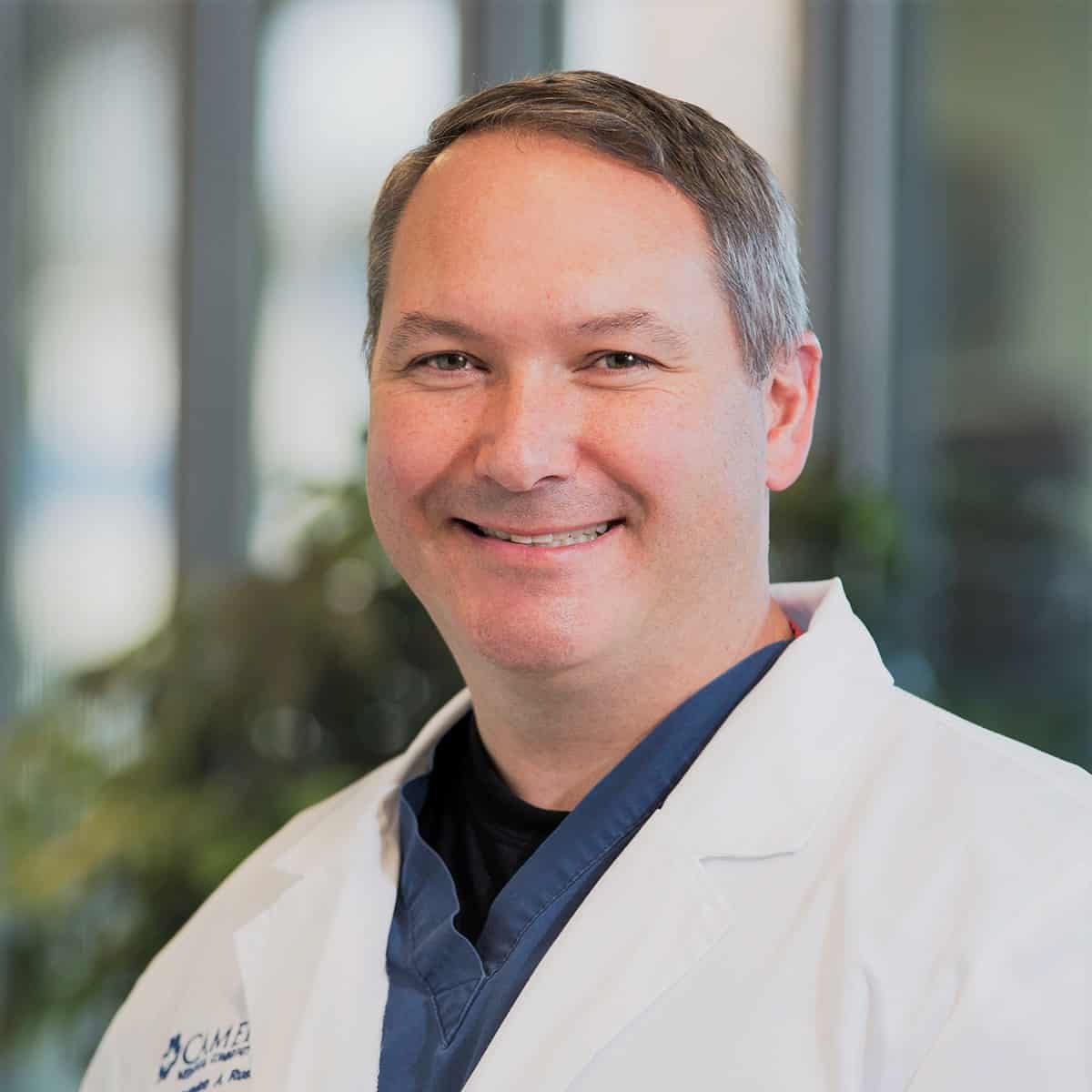 Dr. Brandon Russell
