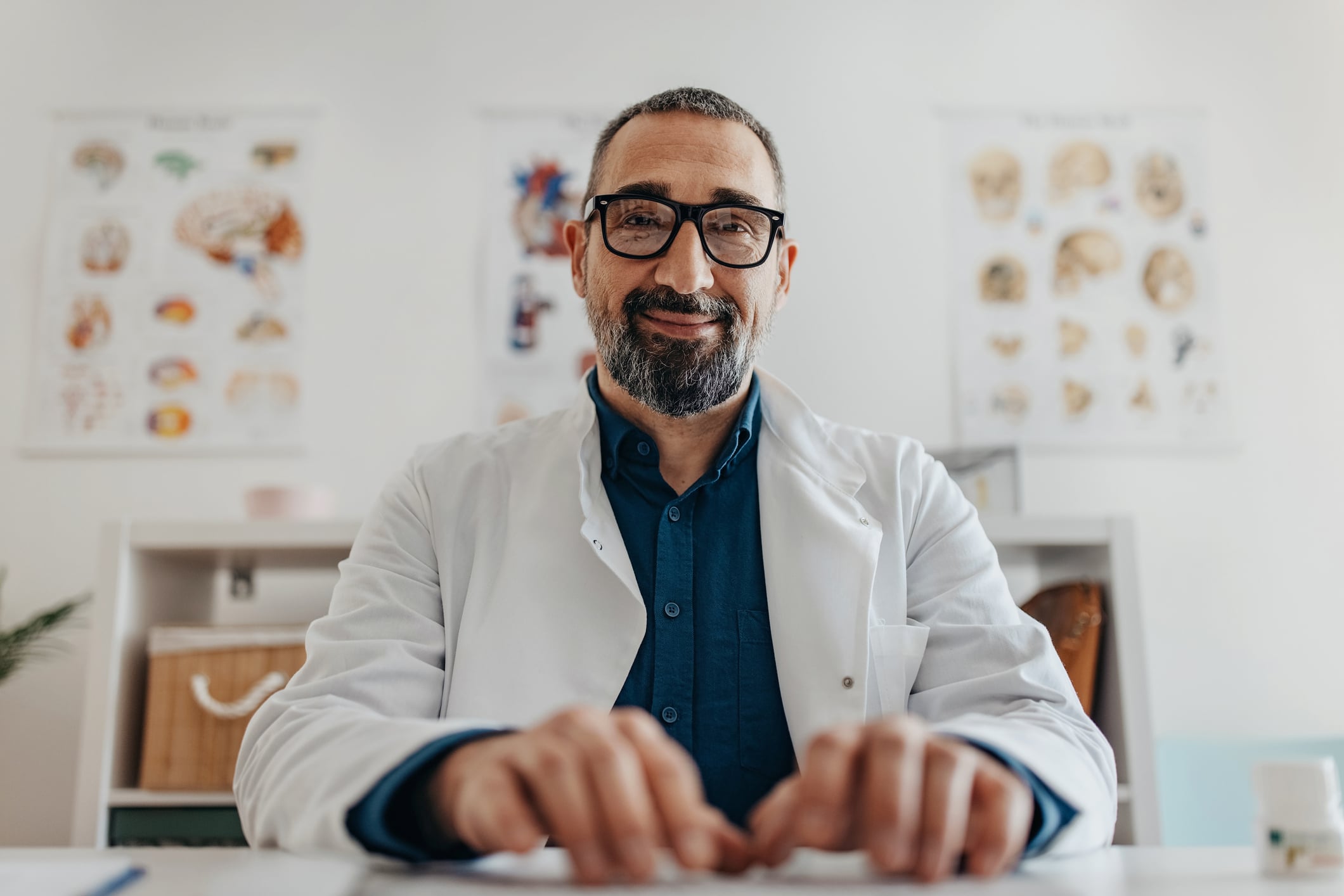 cardiomyopathy cardiologist sitting at desk